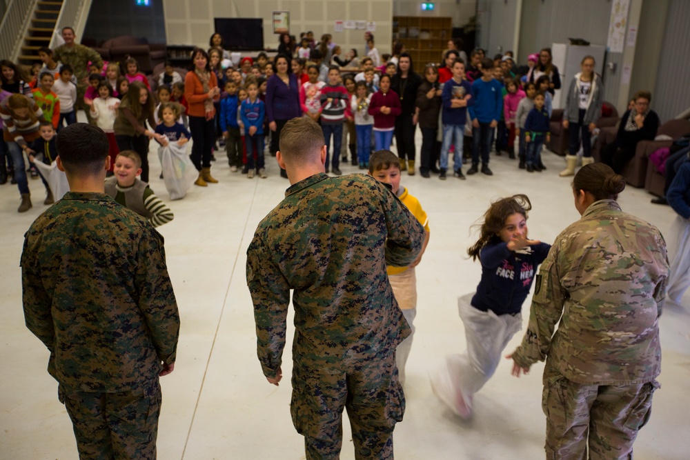 U.S. military members celebrate Christmas early with Romanian children