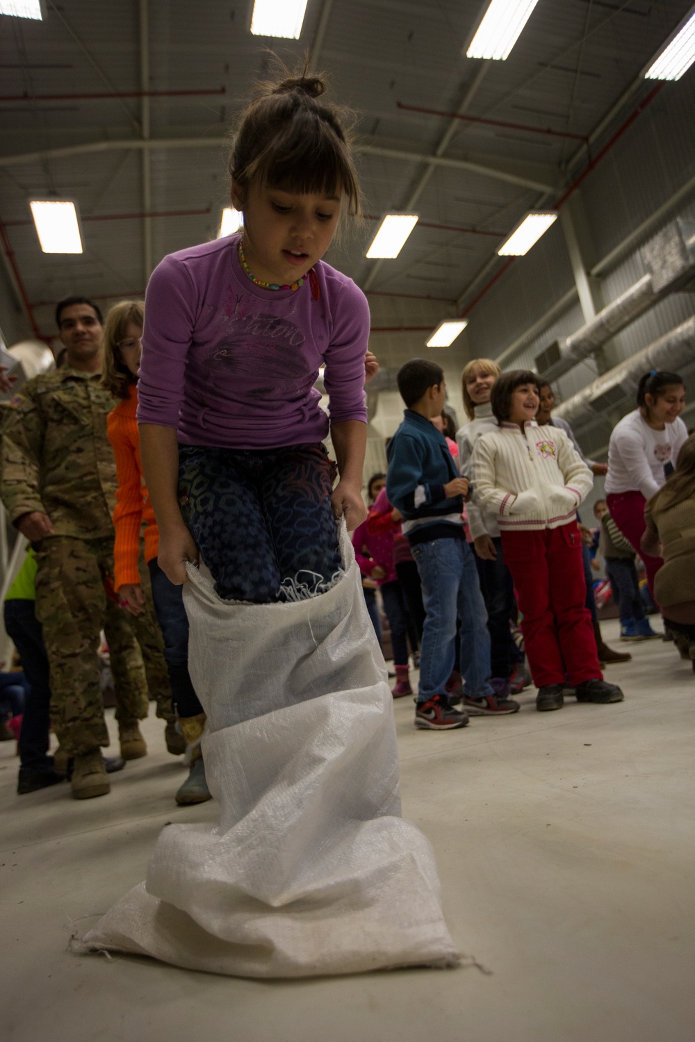 U.S. military members celebrate Christmas early with Romanian children