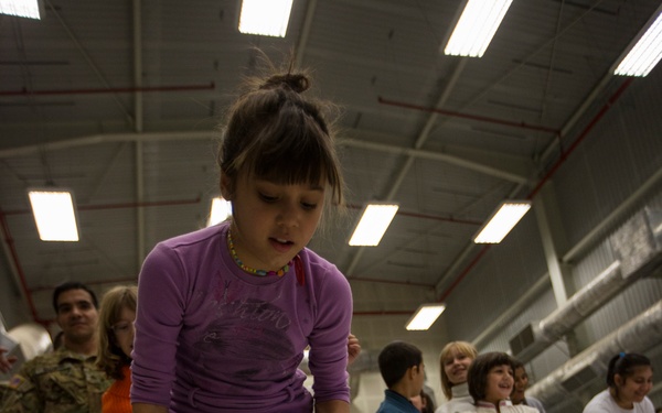 U.S. military members celebrate Christmas early with Romanian children