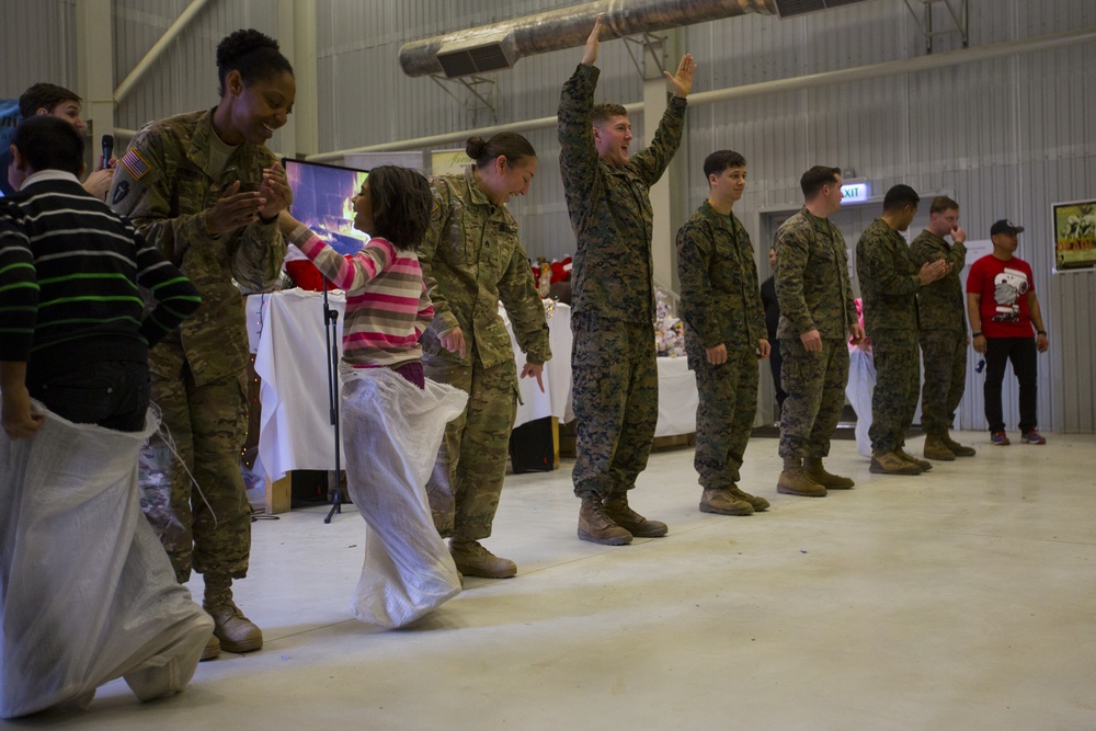 U.S. military members celebrate Christmas early with Romanian children