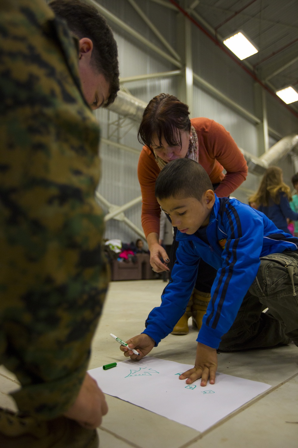 U.S. military members celebrate Christmas early with Romanian children