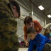 U.S. military members celebrate Christmas early with Romanian children