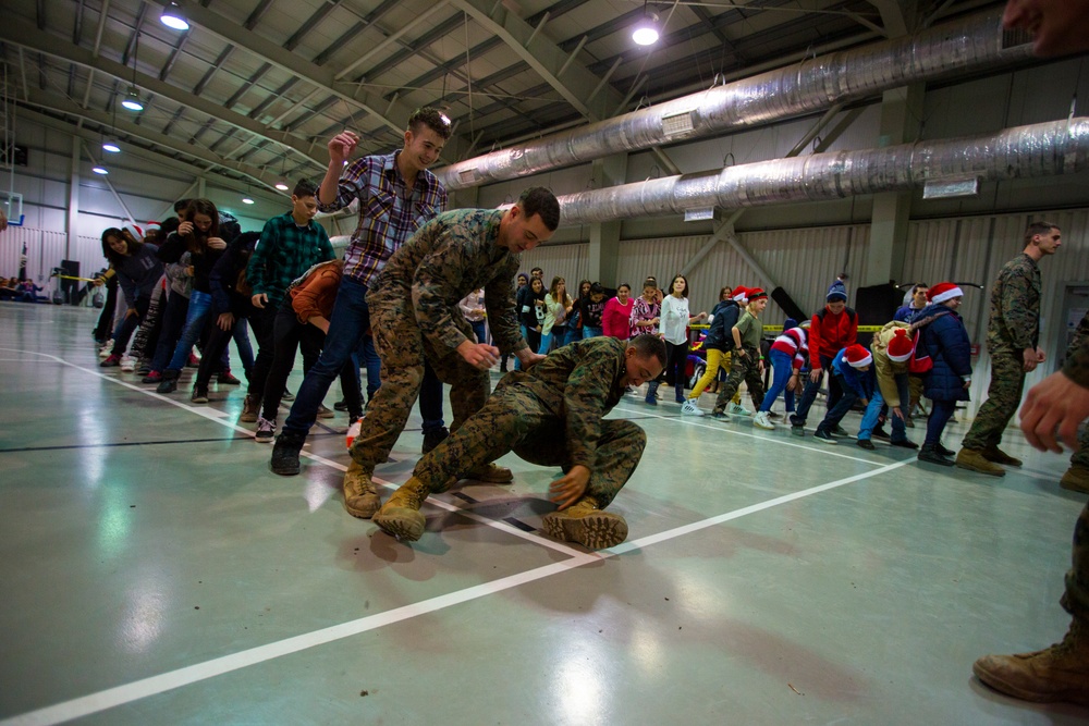 U.S. military members celebrate Christmas early with Romanian children