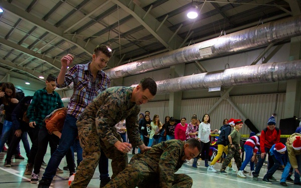 U.S. military members celebrate Christmas early with Romanian children