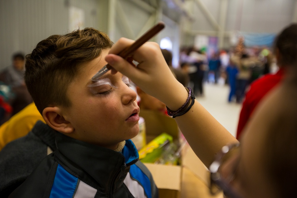 U.S. military members celebrate Christmas early with Romanian children