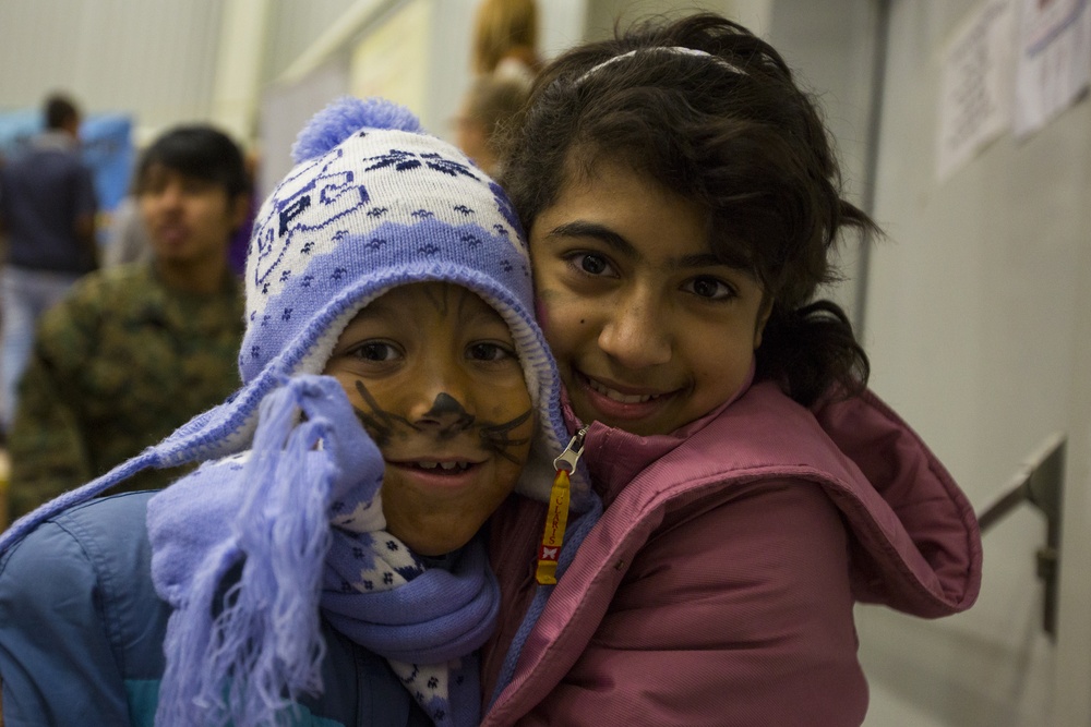 U.S. military members celebrate Christmas early with Romanian children