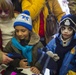 U.S. military members celebrate Christmas early with Romanian children