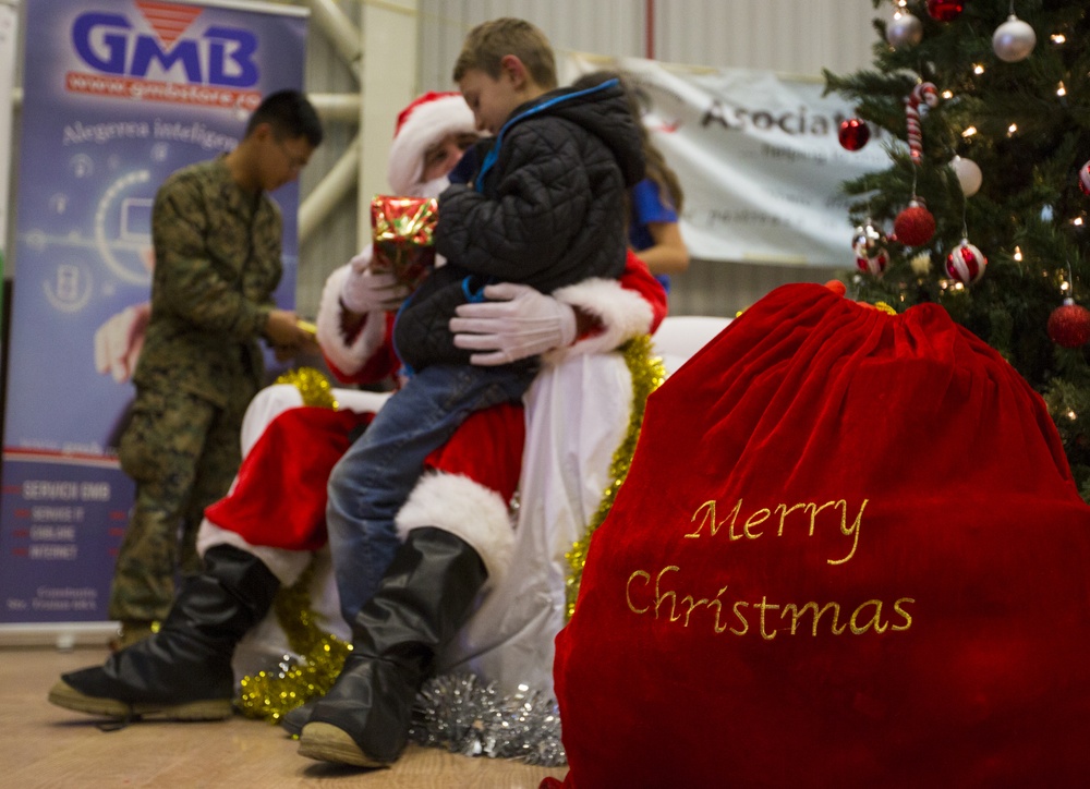 U.S. military members celebrate Christmas early with Romanian children