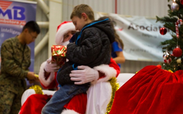 U.S. military members celebrate Christmas early with Romanian children