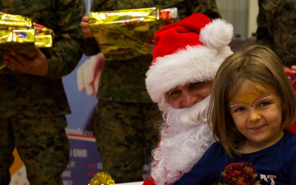 U.S. military members celebrate Christmas early with Romanian children