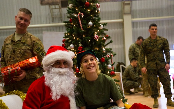 U.S. military members celebrate Christmas early with Romanian children