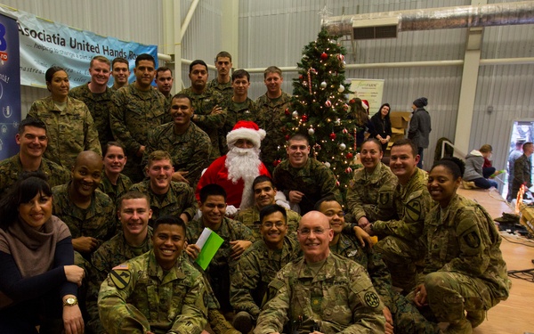 U.S. military members celebrate Christmas early with Romanian children
