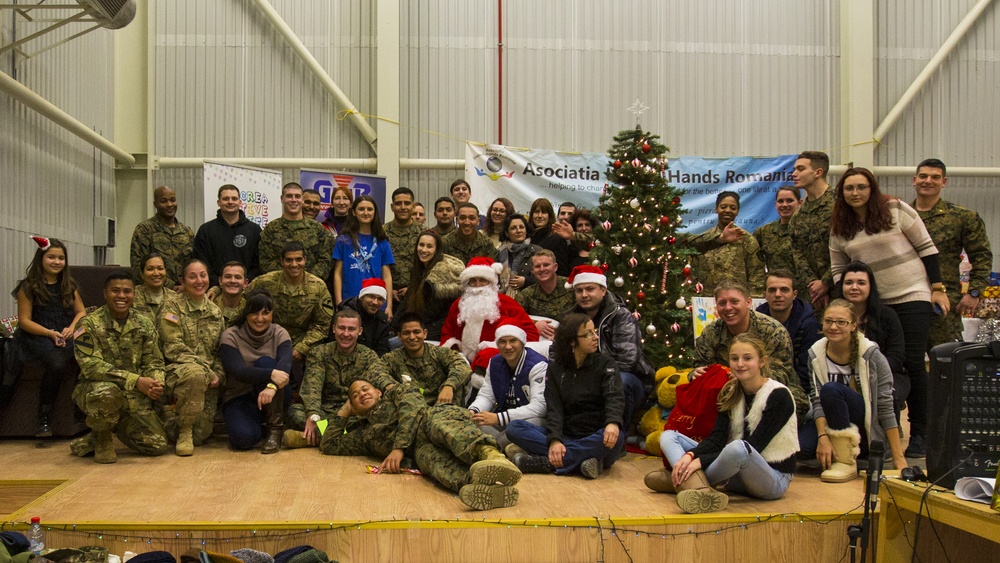 U.S. military members celebrate Christmas early with Romanian children