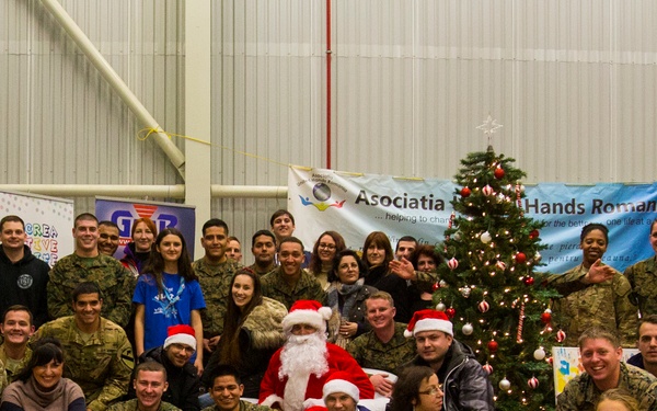 U.S. military members celebrate Christmas early with Romanian children