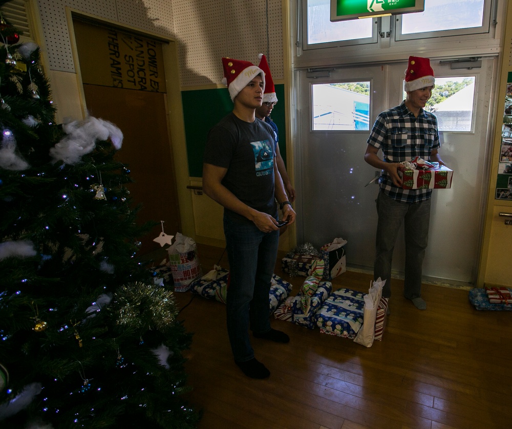 SOFA Personnel bring Christmas joy to Okinawa Residents