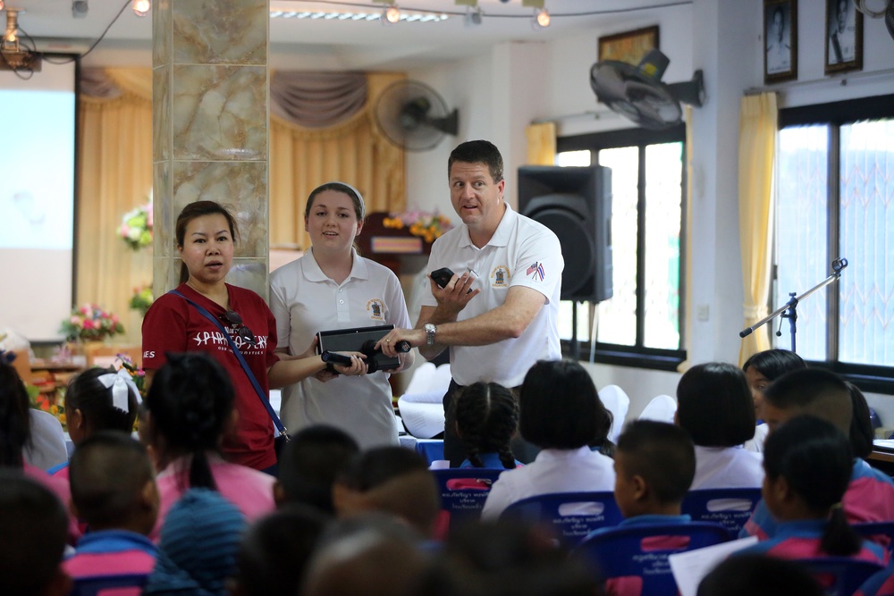 Military Sealift Command Far East, USNS Walter S. Diehl delivers books, holiday cheer to Thai children