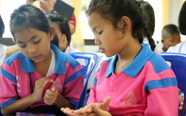 Military Sealift Command Far East, USNS Walter S. Diehl delivers books, holiday cheer to Thai children