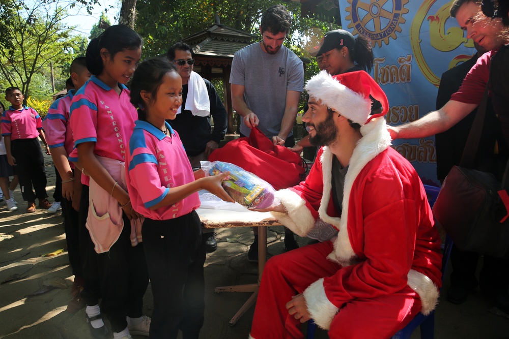 Military Sealift Command Far East, USNS Walter S. Diehl delivers books, holiday cheer to Thai children