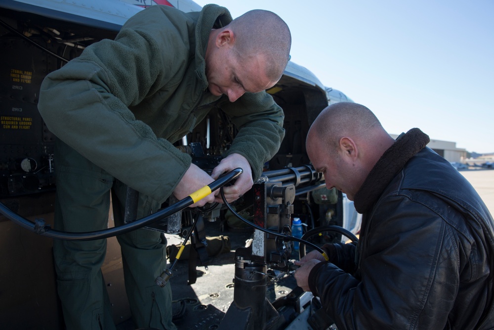 Students take the wheel: HMLAT-303 Marines train pilots, crew chiefs