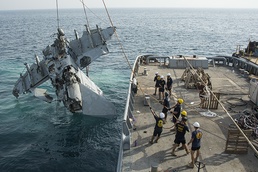 Navy divers salvage F/A-18