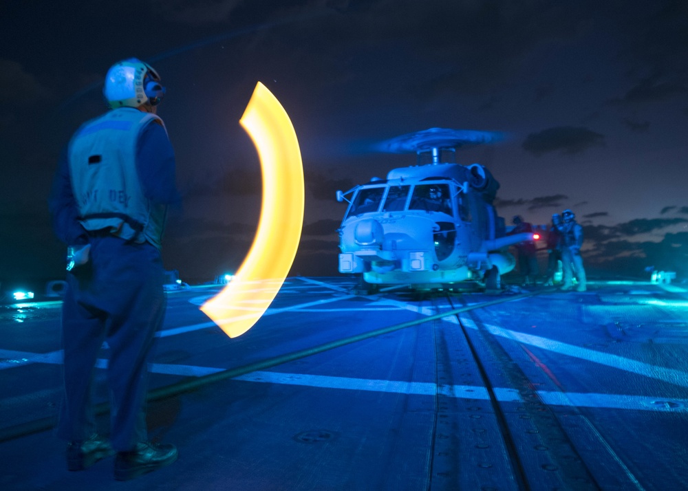 Helicopter refuels aboard USS Bulkeley
