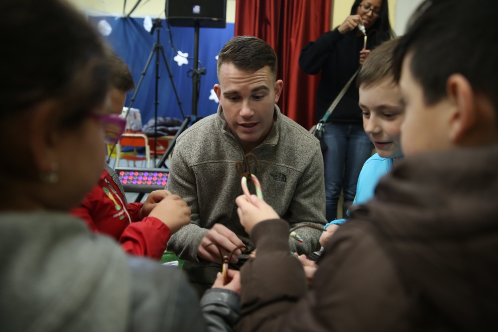 Generosity knows no boundaries: Marines, sailors bring Christmas spirit to Sicilian orphanage