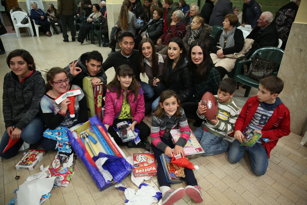 Generosity knows no boundaries: Marines, sailors bring Christmas spirit to Sicilian orphanage