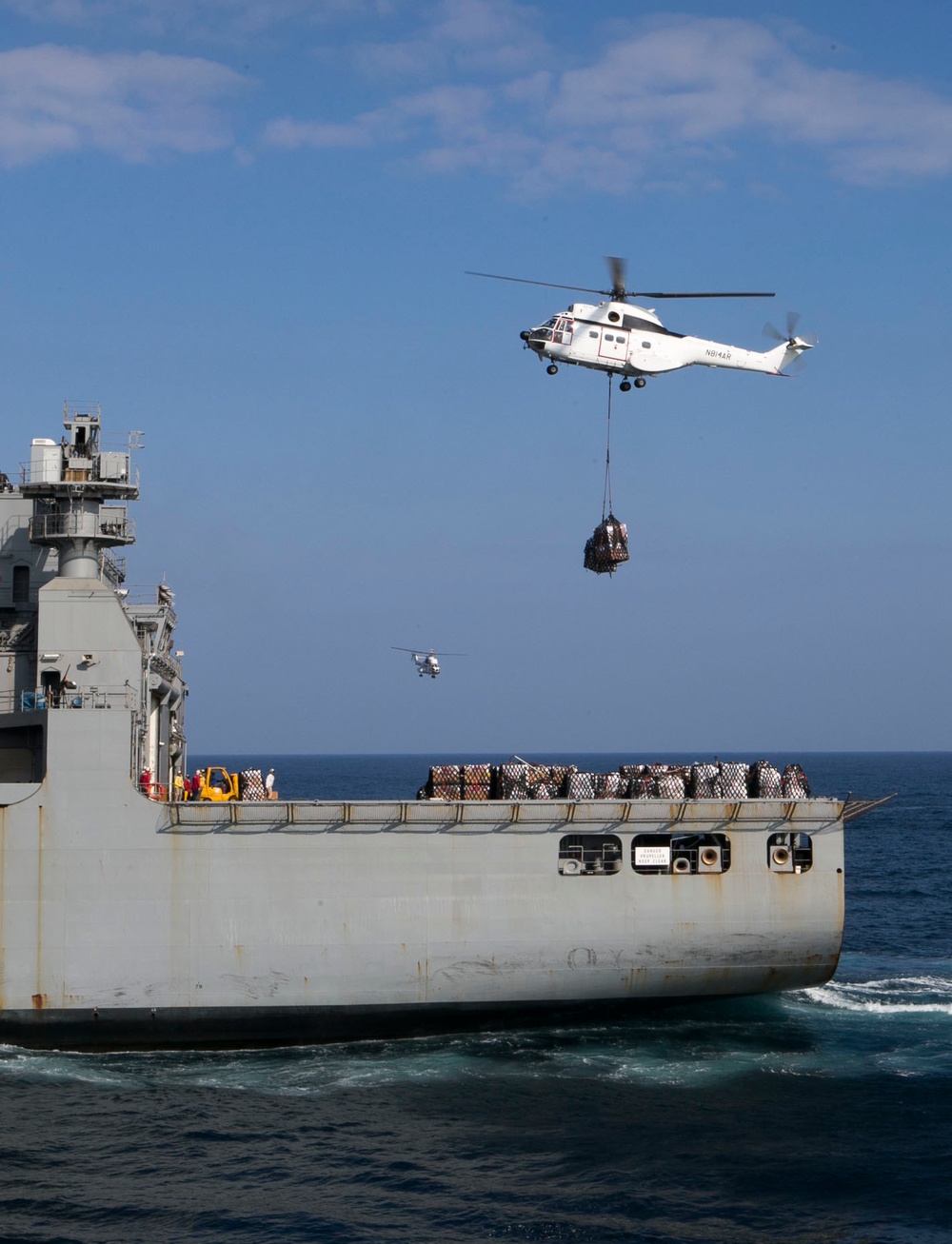 Marines and Sailors receive supplies and mail on Christmas day