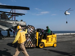 Marines and Sailors receive supplies and mail on Christmas day