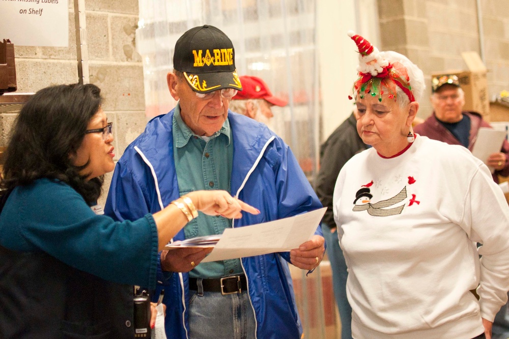 National Sojourners club donates food for Christmas