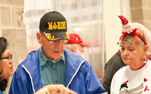 National Sojourners club donates food for Christmas