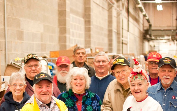 National Sojourners club donates food for Christmas