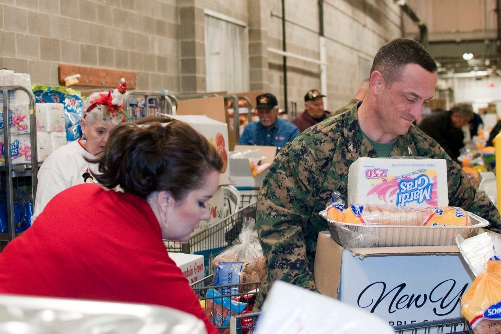 National Sojourners club donates food for Christmas