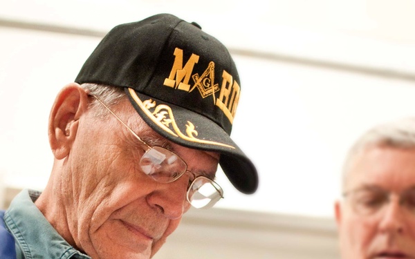 National Sojourners club donates food for Christmas