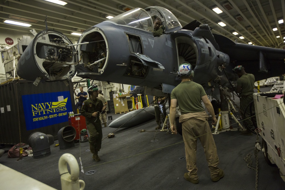 26th MEU Marines conduct maintenance on an AV-8B Harrier