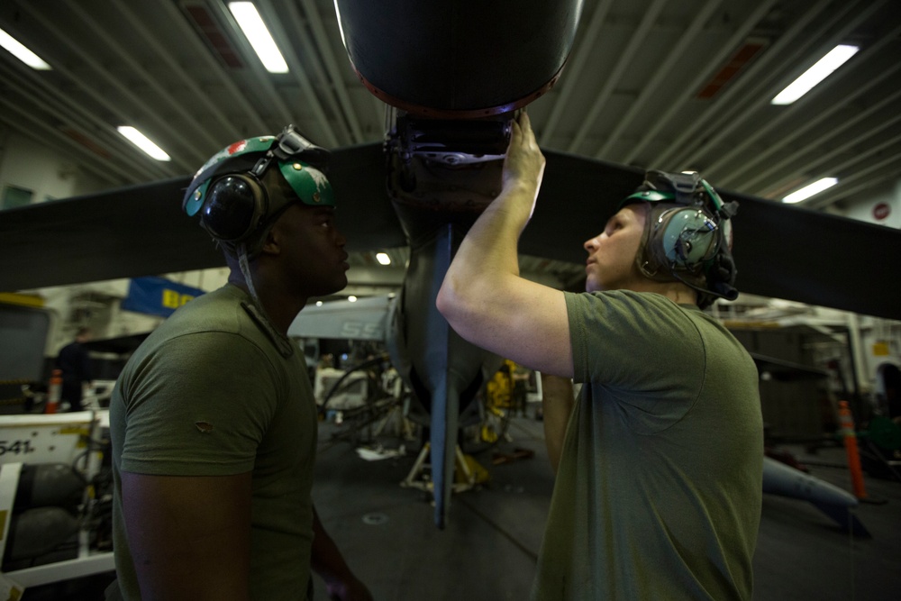 26th MEU Marines conduct maintenance on an AV-8B Harrier