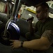 26th MEU Marines conduct maintenance on an AV-8B Harrier
