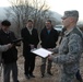 KFOR hands Camp Cabra land back to local landowners outside Zubin-Potok