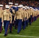 Marines stand together to unfurl Old Glory at 38th annual Holiday Bowl