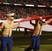 Marines stand together to unfurl Old Glory at 38th annual Holiday Bowl