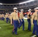 Marines stand together to unfurl Old Glory at 38th annual Holiday Bowl