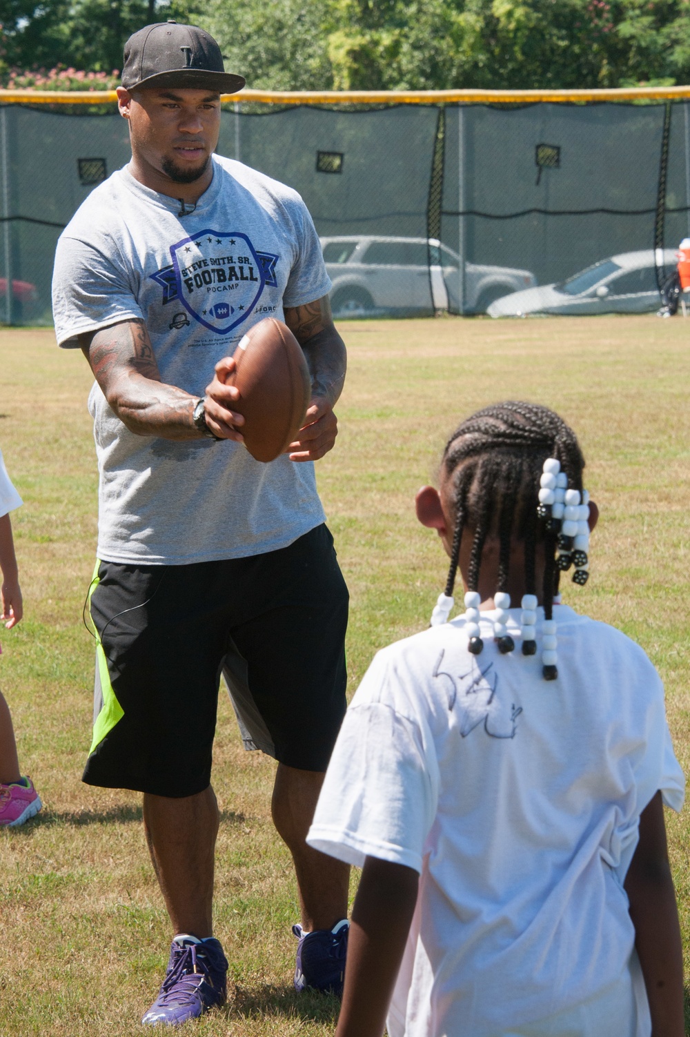Baltimore Ravens player brings camp to Maxwell