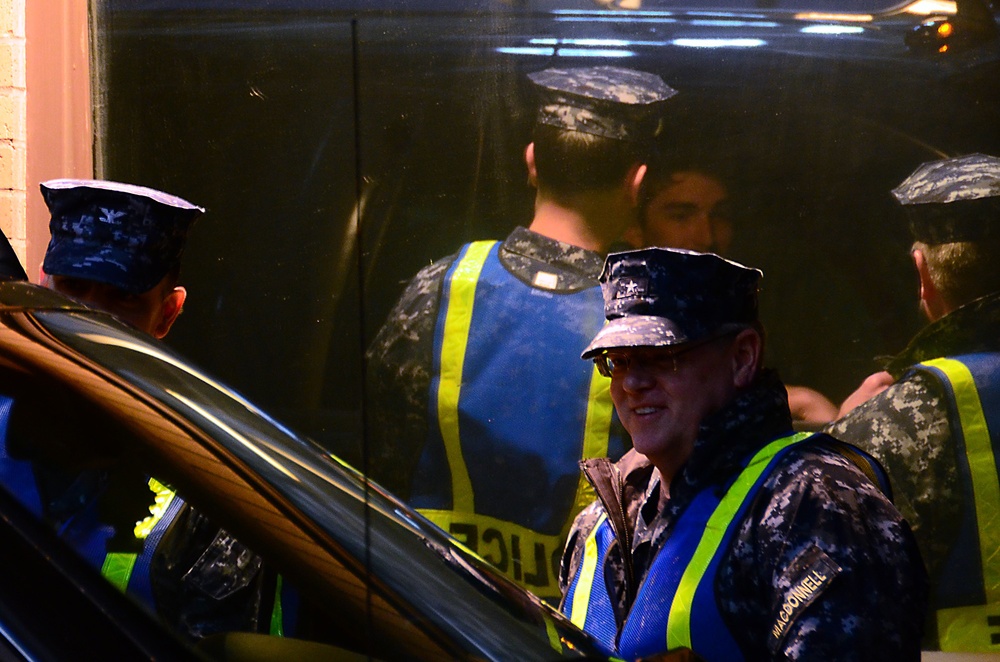 Commanders check IDs at base main gate