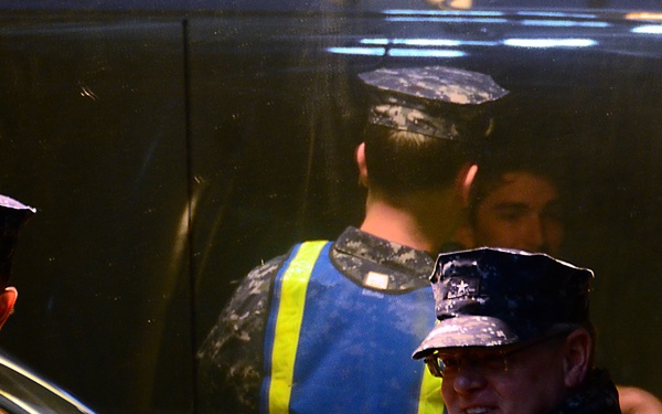 Commanders check IDs at base main gate