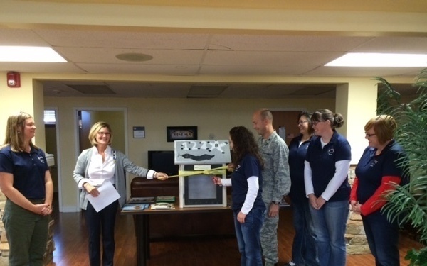 DAR presents book hut to 122nd Fighter Wing