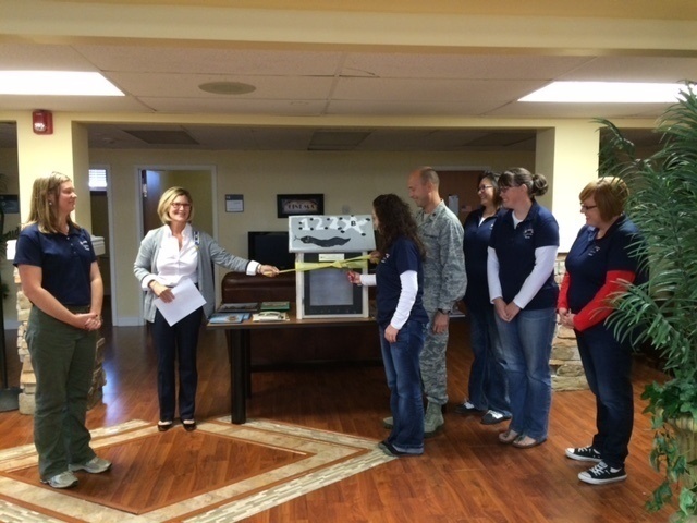 DAR presents book hut to 122nd Fighter Wing