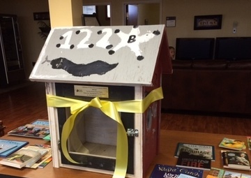 DAR presents book hut to 122nd Fighter Wing