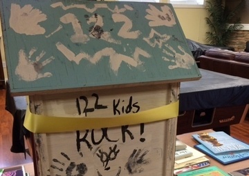 DAR presents book hut to 122nd Fighter Wing