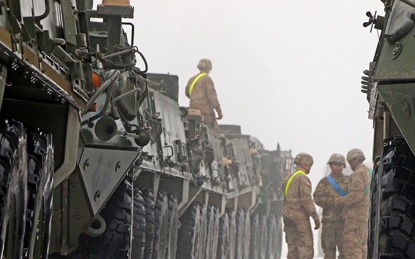 Country hopping cavalry unit unloads train before training
