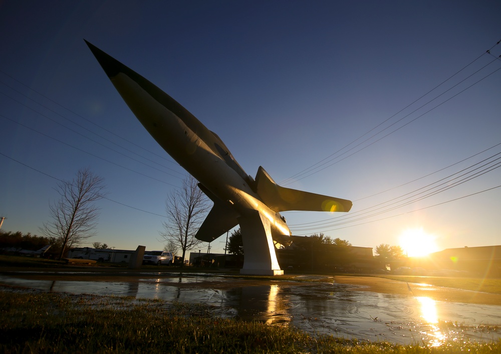 Static display aircraft at sunrise